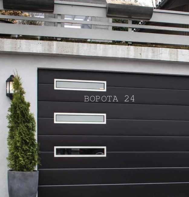 Дизайнерские теплые ворота в гараж